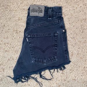 Distressed blue jean shorts